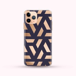 May include: A clear phone case with a geometric pattern of gold and navy blue triangles.