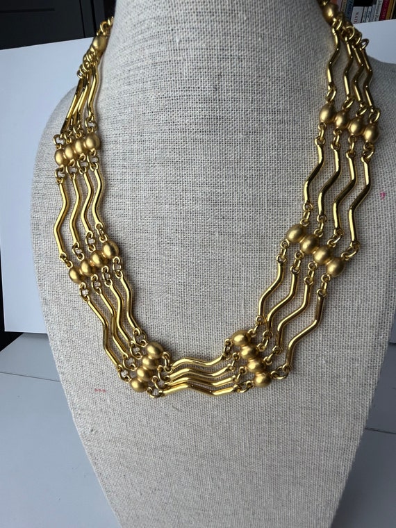 Vintage Monet Gold Tone Four Strand Wavy Necklace