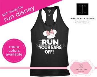 May include: Black racerback tank top with a Minnie Mouse graphic and the text "RUN YOUR EARS OFF!". The tank top also has the text "get ready for run disney" and "more colors available". The tank top is moisture wicking.