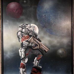 May include: A futuristic space explorer in a white and red suit stands on a rocky surface, holding a large gun. The explorer is looking out at a blue planet and a red planet in the distance. The background is a dark space with stars.