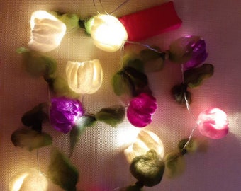 Umfilzte Lichterkette in rosa lila weiß