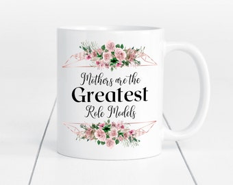 May include: White ceramic mug with a floral design and the text "Mothers are the Greatest Role Models".