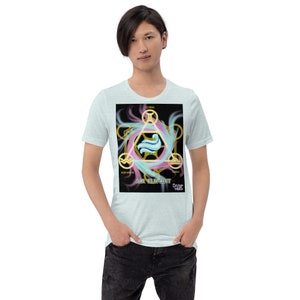 May include: A light blue t-shirt with a graphic of a gold and blue air element symbol with the zodiac signs Gemini, Aquarius, and Libra. The text "Air Element" is below the symbol.