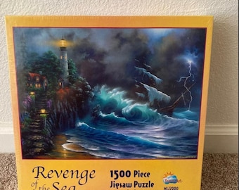 May include: A 1500-piece jigsaw puzzle titled "Revenge of the Sea" by David Miller. The puzzle depicts a stormy seascape with a lighthouse, crashing waves, and a ship. The puzzle measures 24 by 33 inches.