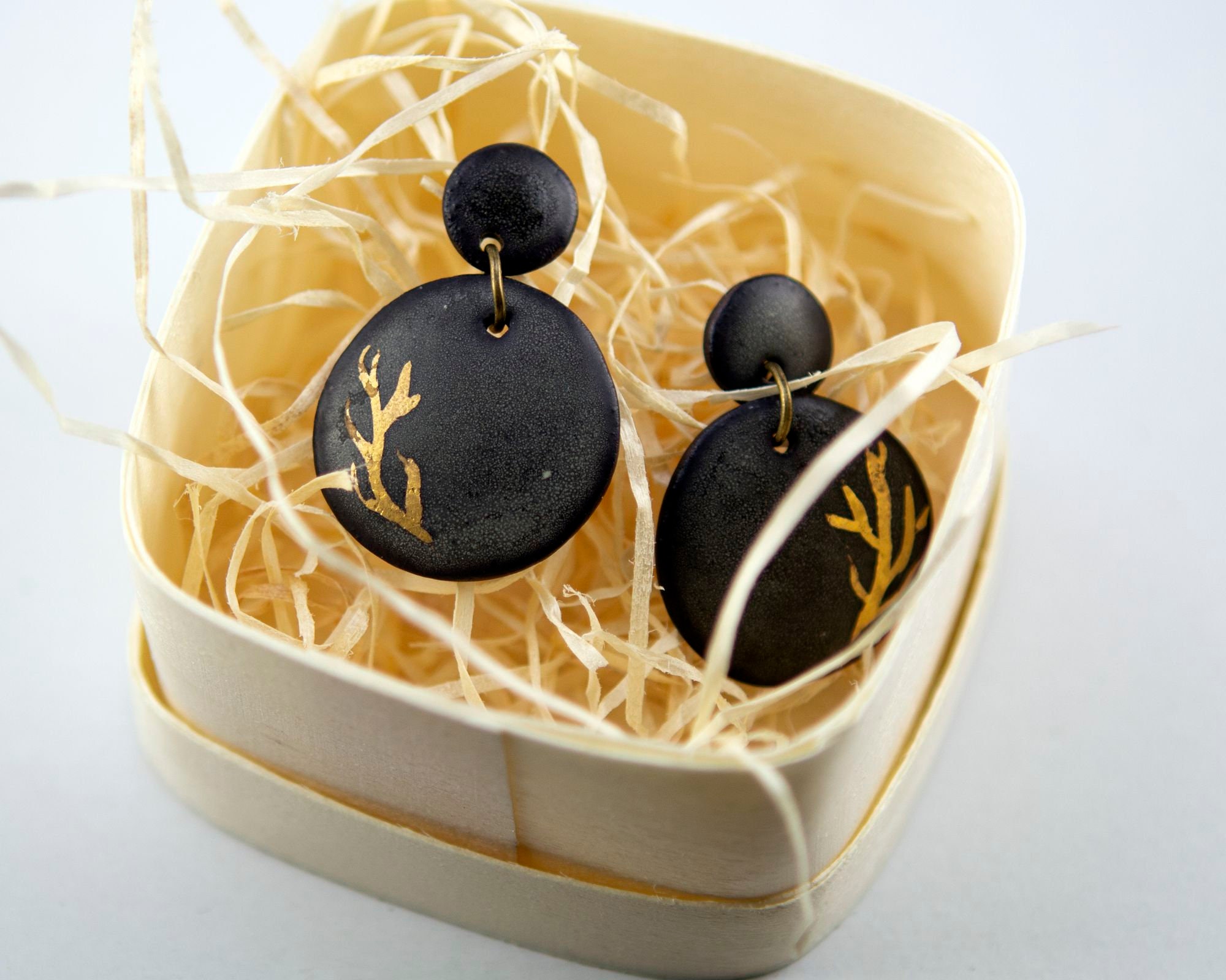 Black porcelain dangle earrings collection. Oculinidae