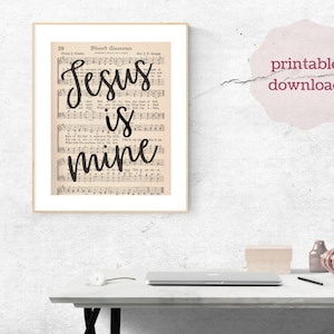 May include: Printable digital download of a vintage music sheet with the text "Jesus is mine" in black calligraphy.