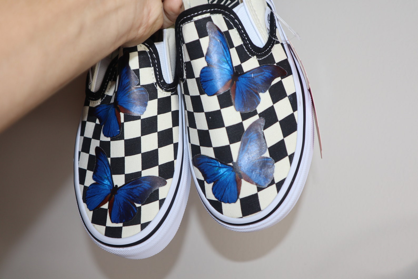 blue butterfly slip on vans