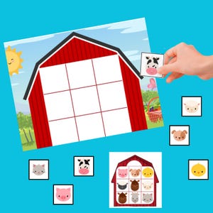 May include: A farm-themed matching game featuring a red barn with a grid, animal face cards, and a hand holding a cow card. Other animal faces include a cat, pig, sheep, dog, chick, horse, and a pig. The game is set against a blue background.