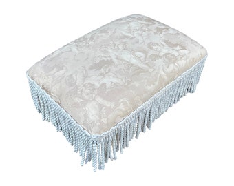 Mid Century Regency Style Ottoman in Beige Cherub Upholstery & White Tassels