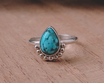 Anel turquesa em formato de lágrima, joia personalizada feita à mão por nativos americanos.