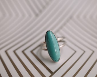 Anillo turquesa de cuello largo