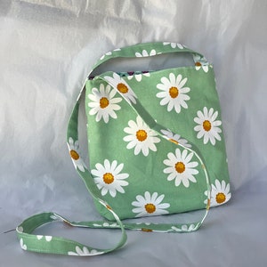Crossover bag in  white daisy print on mint green
