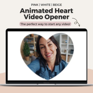 Peut inclure: Un écran d'ordinateur portable affichant le visage d'une femme dans un cadre en forme de cœur. Le texte "Animated Heart Video Opener" et "The perfect way to start any video!" est affiché à l'écran.