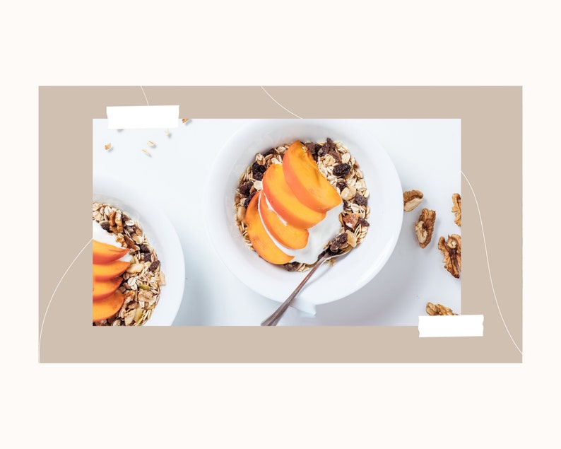 May include: A white bowl filled with granola, yogurt, and sliced peaches. The bowl is on a white surface with a few walnuts scattered around it.