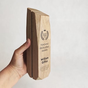 Irregular shaped solid oak trophy decorated with UV print on front side, sustainable wooden prize for best partner, eco-friendly trophy
