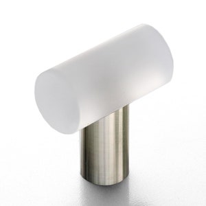 May include: A white frosted glass T-shaped cabinet knob with a brushed nickel base.
