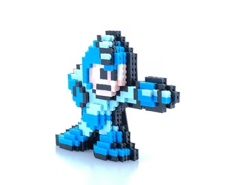 May include: A blue and black pixelated figure of a video game character. The figure is standing with its right arm extended and holding a weapon.