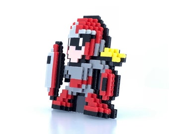 May include: Pixelated figurine of a knight in red, gray, black, and yellow. The knight has a shield and is posed in a standing position. The figure is made of small, square blocks, giving it a retro video game aesthetic.