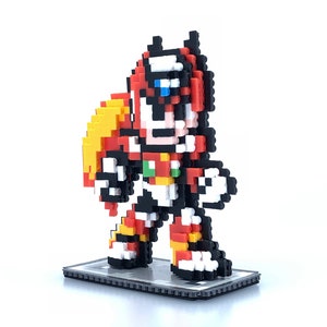 May include: A pixel art figure of a red and black robot with a yellow cape. The robot is standing on a gray base.