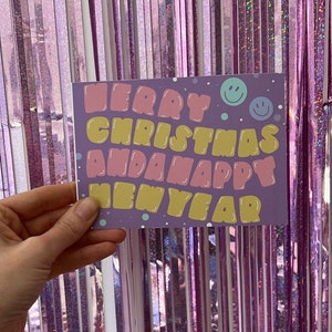 Weihnachts-Postkarte "Merry Christmas & happy new year" - Pastell Grußkarte zu Weihnachten mit Balloonschrift, Smiley - pastellfarben modern
