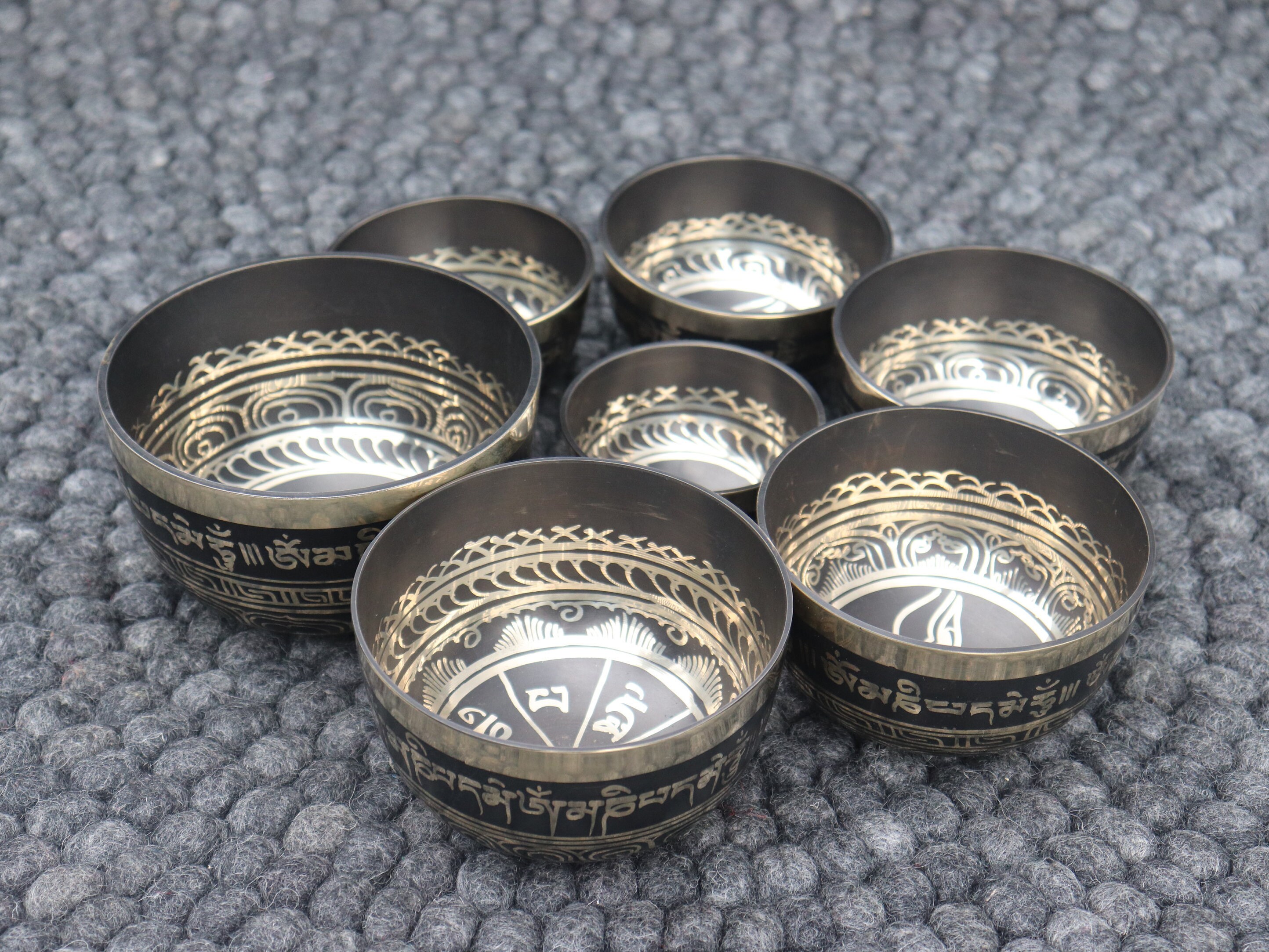 Set of 7 Buddha Eyes Carved Mantra Singing Bowls - Tibetan Singing Bowl ...