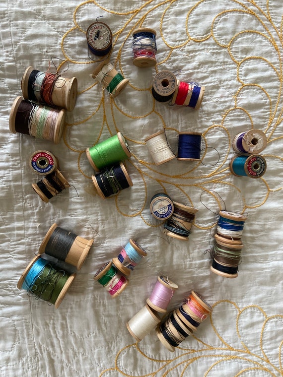 27 vintage wooden thread spools of assorted sizes!