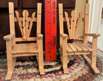 Fun pair of miniature rocking chairs neatly assembled with wooden spring style clothespins! I will call it  modern folk art!