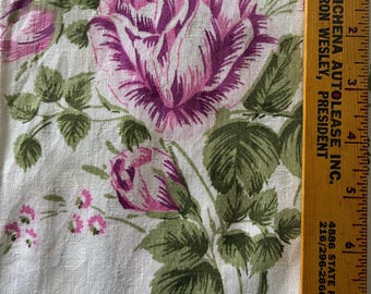 Beautiful vintage remnant with purple lavender roses on a cream background with dots woven in the background. it is 11 inches by 8 yards!