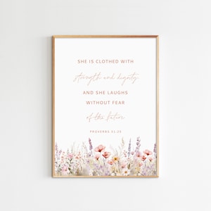 May include: A printable wall art design with a floral border and a quote in a copper color: "She is clothed with strength and dignity, and she laughs without fear of the future. Proverbs 31:25"