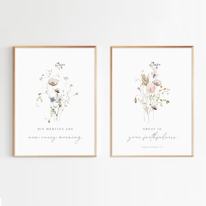 May include: Two framed prints with watercolour floral illustrations and inspirational quotes. The left print features a bouquet of white and blue flowers with the quote "His mercies are new every morning". The right print features a bouquet of pink and brown flowers with the quote "Great is your faithfulness, Lamentations 3:23".