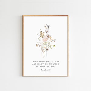 Peut inclure: Une peinture à l'aquarelle d'un bouquet de fleurs avec une citation de Proverbes 31:25 : "Elle est vêtue de force et de dignité : elle peut rire des jours à venir."
