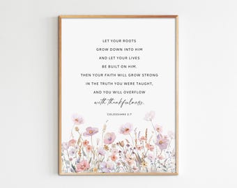 May include: A framed print featuring inspirational text and floral artwork. The text reads "Let your roots grow down into Him..." with the reference Colossians 2:7. The bottom of the print displays a watercolor-style illustration of pink and purple wildflowers.