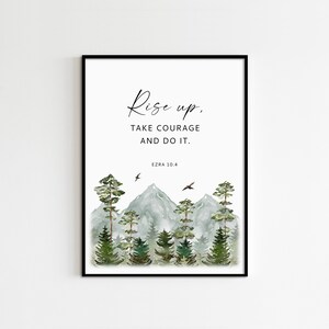 May include: A watercolor print with a quote that reads "Rise up, take courage and do it."  The quote is attributed to Ezra 10:4. The image features a watercolor painting of a mountain range with trees and birds flying overhead.