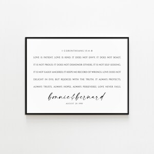 May include: Black and white printable wall art with a quote from the Bible, 1 Corinthians 13:4-8, about love. The quote reads: "Love is patient. Love is kind. It does not envy, it does not boast. It is not proud. It does not dishonor others. It is not self-seeking. It is not easily angered, it keeps no record of wrongs. Love does not delight in evil but rejoices with the truth. It always protects. Always trusts, always hopes, always perseveres. Love never fails." The art also includes the names "bonnie & bernard" and the date "August 20 1990".