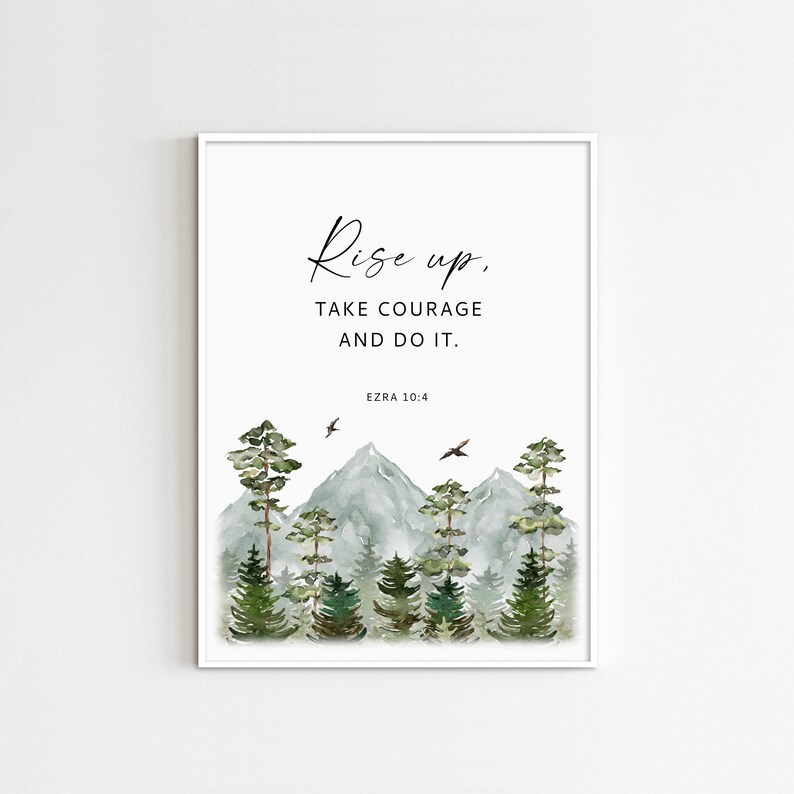 May include: A watercolor print with a quote that reads "Rise up, take courage and do it. Ezra 10:4". The image features a mountain range with trees and birds flying overhead.