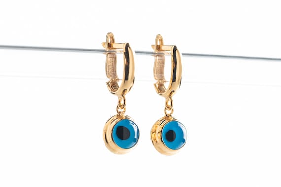 Boucles d'oreilles créoles en or 18 carats : mauvais œil, lotus, étoile - France