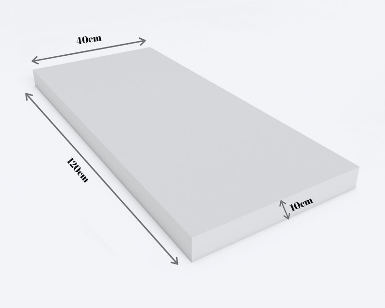 May include: A rectangular, light gray foam block. The block measures 40cm wide, 120cm long, and 10cm thick. The foam has a smooth, uniform surface. The dimensions are clearly labeled with arrows and measurements.