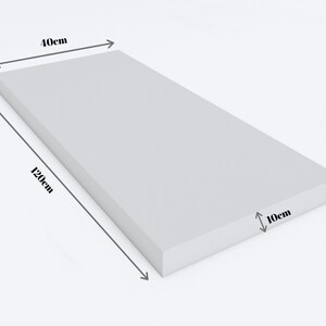 May include: A rectangular, light gray foam block, 40cm x 120cm x 10cm. The block has a smooth, uniform surface and is shown against a plain white background. The dimensions are clearly marked with arrows.