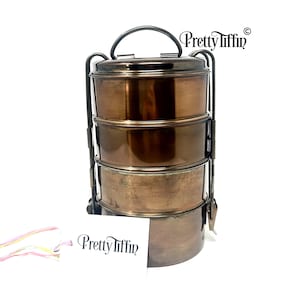 Bronze tiffin lunchbox 
Antique tiffin box 
stainless steel lunchbox