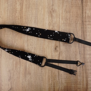 star on black clip on ukulele hook strap with no drilling, no button