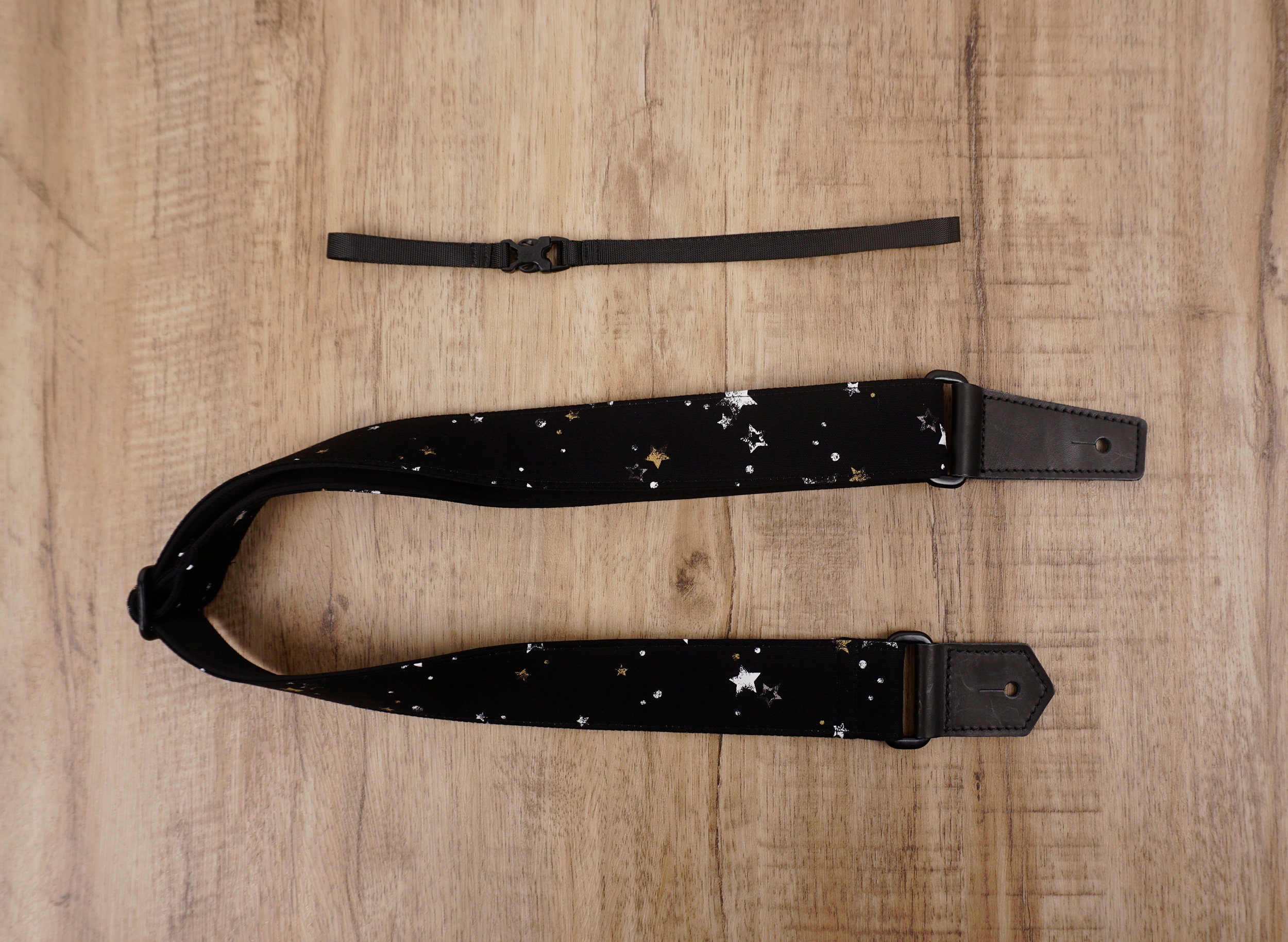 Personalized star on black ukulele shoulder strap with leather ends
