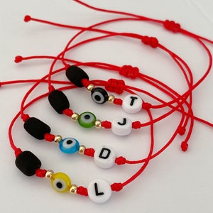 Bracelet bébé mauvais œil, bracelet ficelle rouge, bracelet de protection, amulette, cadeau baby shower, cadeau nouveau-né, troisième œil, azabache, mal de peau