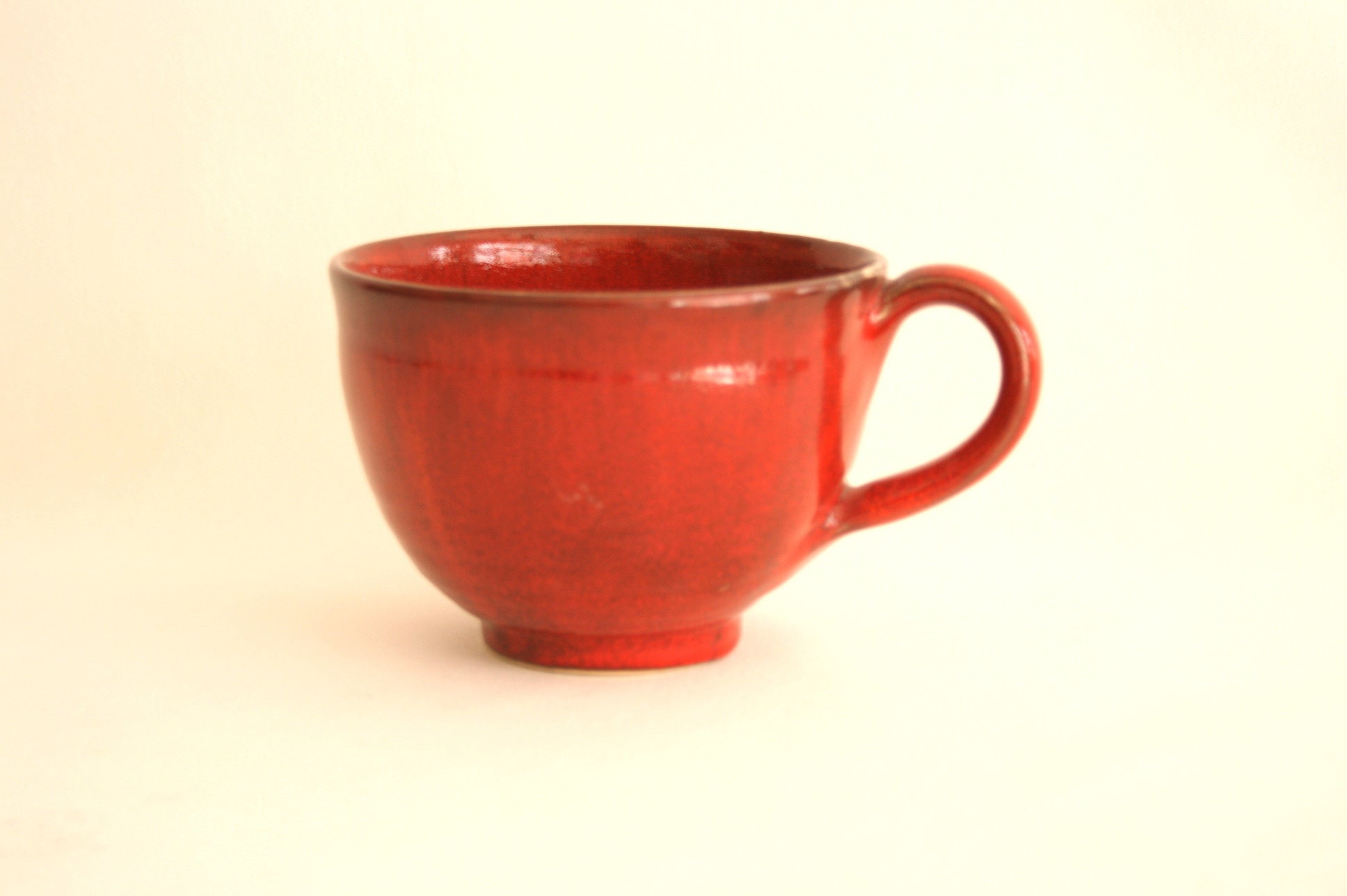 Taza de cerámica en rojo -  España