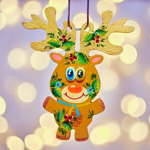 Ukrainian Christmas ornament with Petrykivka painting, Hand painted wooden deer, Funny reindeer figurine decor,  Winter folk art gift
