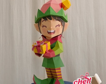 Papercraft elf, Christmas, holiday, festive, elf, Santa's helper, jingle bells, yuletide, merry, magical, joy, celebration