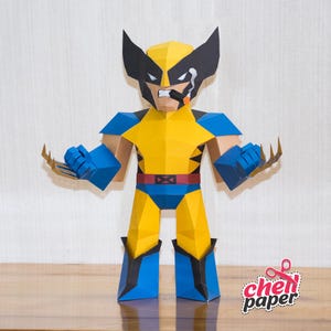 May include: A yellow and blue papercraft figure of Wolverine from the X-Men comics. The figure is holding a pair of claws in each hand and has a cigarette in its mouth. The figure is standing on a wooden surface.