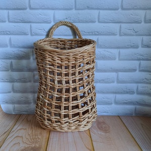 Wicker decor for the front door. Wall wicker basket for flowers. Wall basket for fruits and vegetables. Wall Hanging Storage Basket