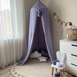 Canopy with 2 pompoms