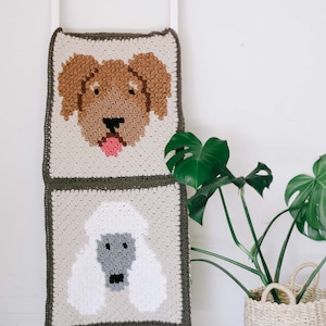 A golden doodle and poodle portrait dog blanket draped on a white stair.