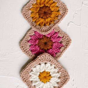 Three flower granny squares.